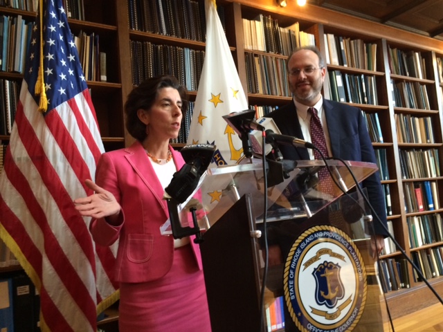 Raimondo, shown with Commerce Secretary Stefan Pryor, during a 2016 announcement.