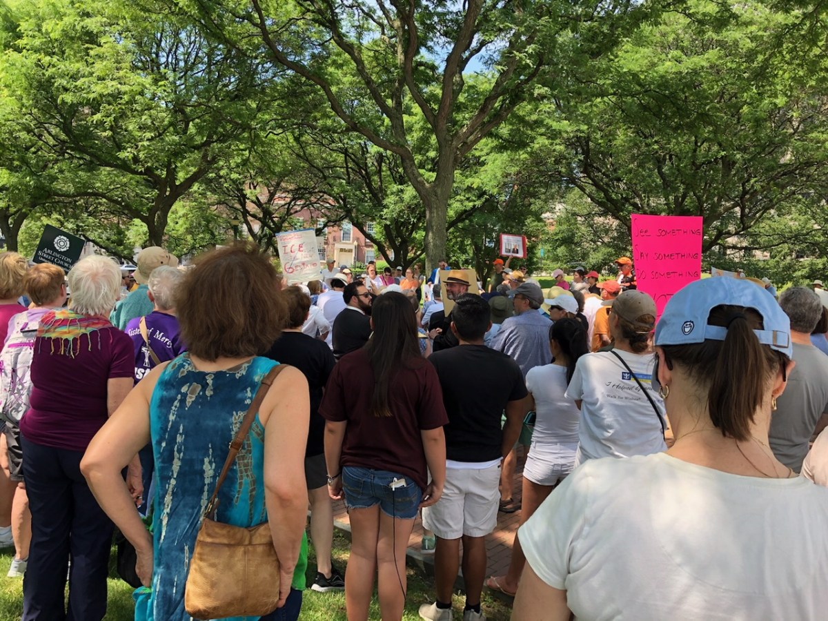 A gathering on the lawn of the RI Statehouse protesting new immigration policies.