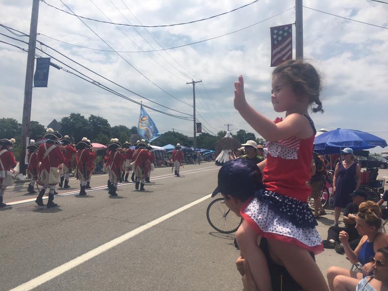 Onlookers enjoy the 233rd Bristol Fourth of July celebration.