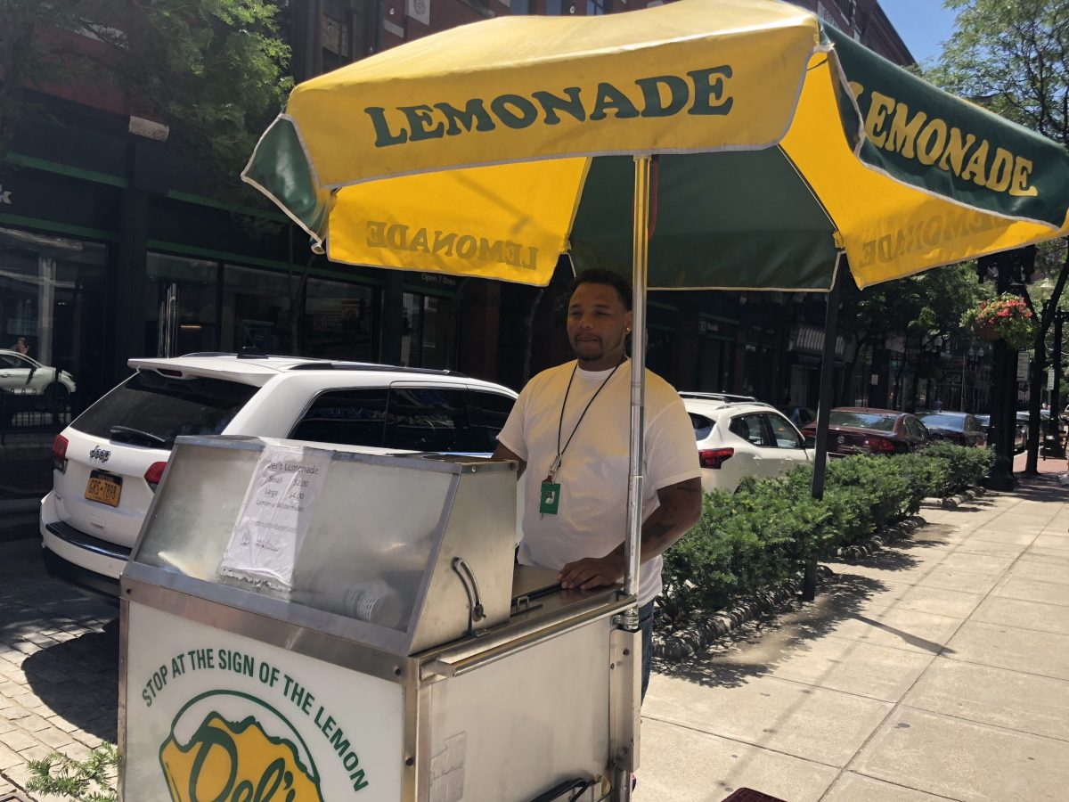 Teddie Moore sells Del's Lemonade on Westminster Street.