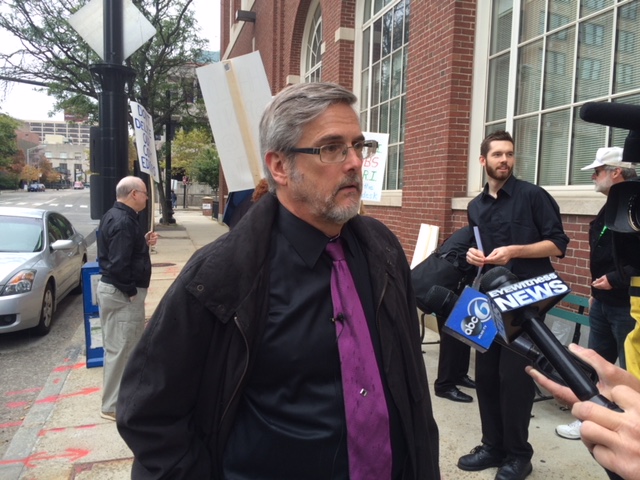 Hill speaks during a 2014 protest outside the ProJo.