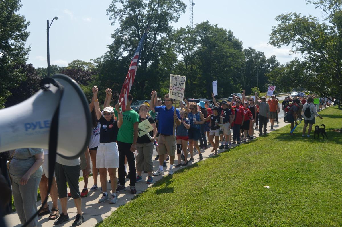 Pro-gun control activists marched 50 miles from Worcester to hold a rally across the street from gunmaker Smith & Wesson's headquarters in Springfield, Massachusetts.