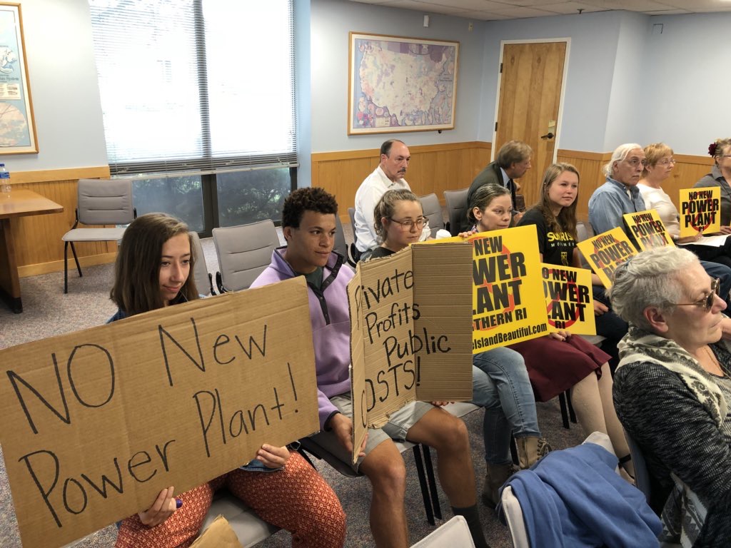 Power plant opponents attend a September hearing in Warwick for the proposed project. The plant's developer recently lost a contract with New England's electrical grid operator -- another possible roadblock to the project's final approval.