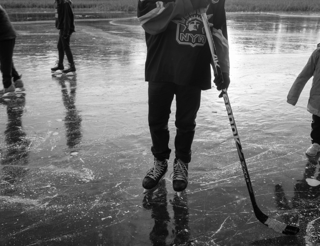 Black ice on a lake, fast-frozen with no snow, is a unique natural element.