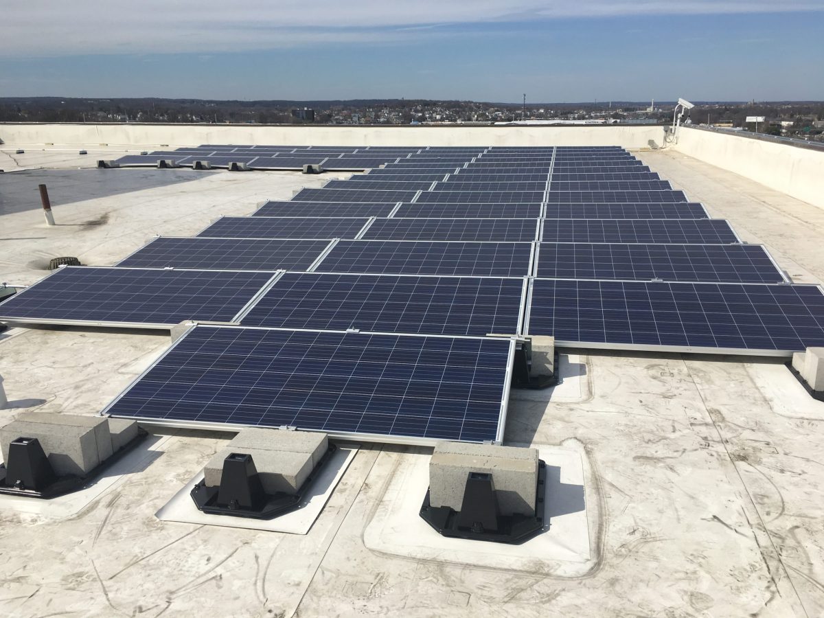 Solar panels on top of the RI Department of Administration building. The siting of solar projects is just one issue ECRI will be fighting to resolve this legislative session.