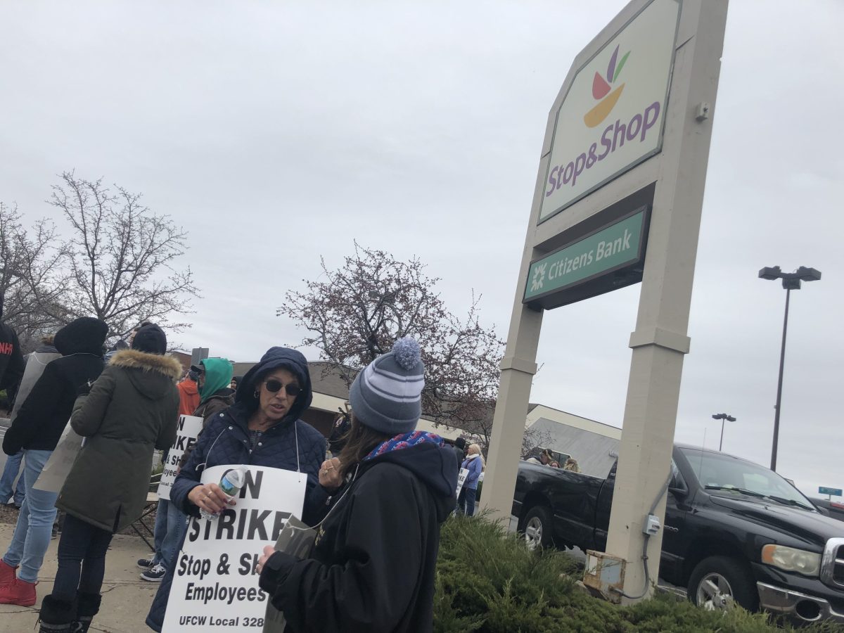 Workers protest outside a Stop & Shop in Providence's Mount Hope neighborhood. They joined 31,000 others who went on strike this week.