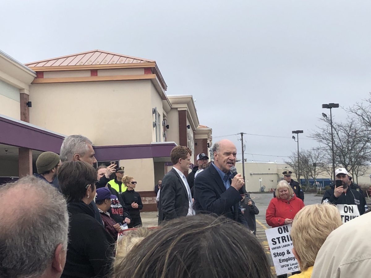 Rep. Bill Keating speaks at a rally outside a Stop & Shop in Fall River.