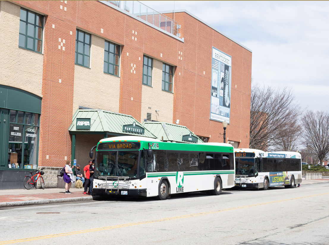 Riders board the R-Line bus at the downtown hub.