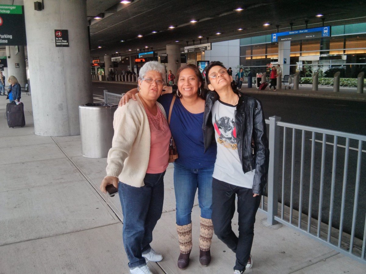 Sam's mom, their cousin, and Sam the moment they arrive in Providence