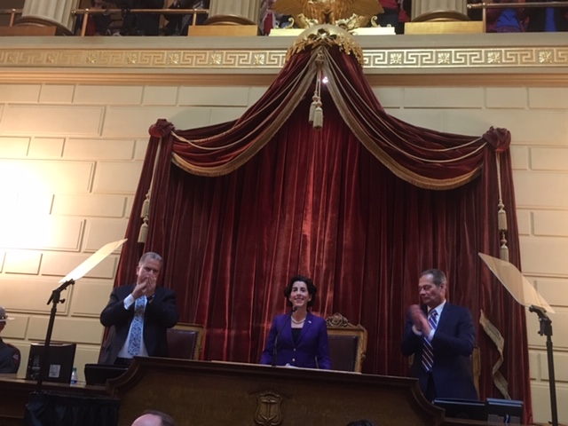 Gov. Raimondo and top lawmakers, shown before the pandemic, will have their hands full in trying to improve the budget outlook.