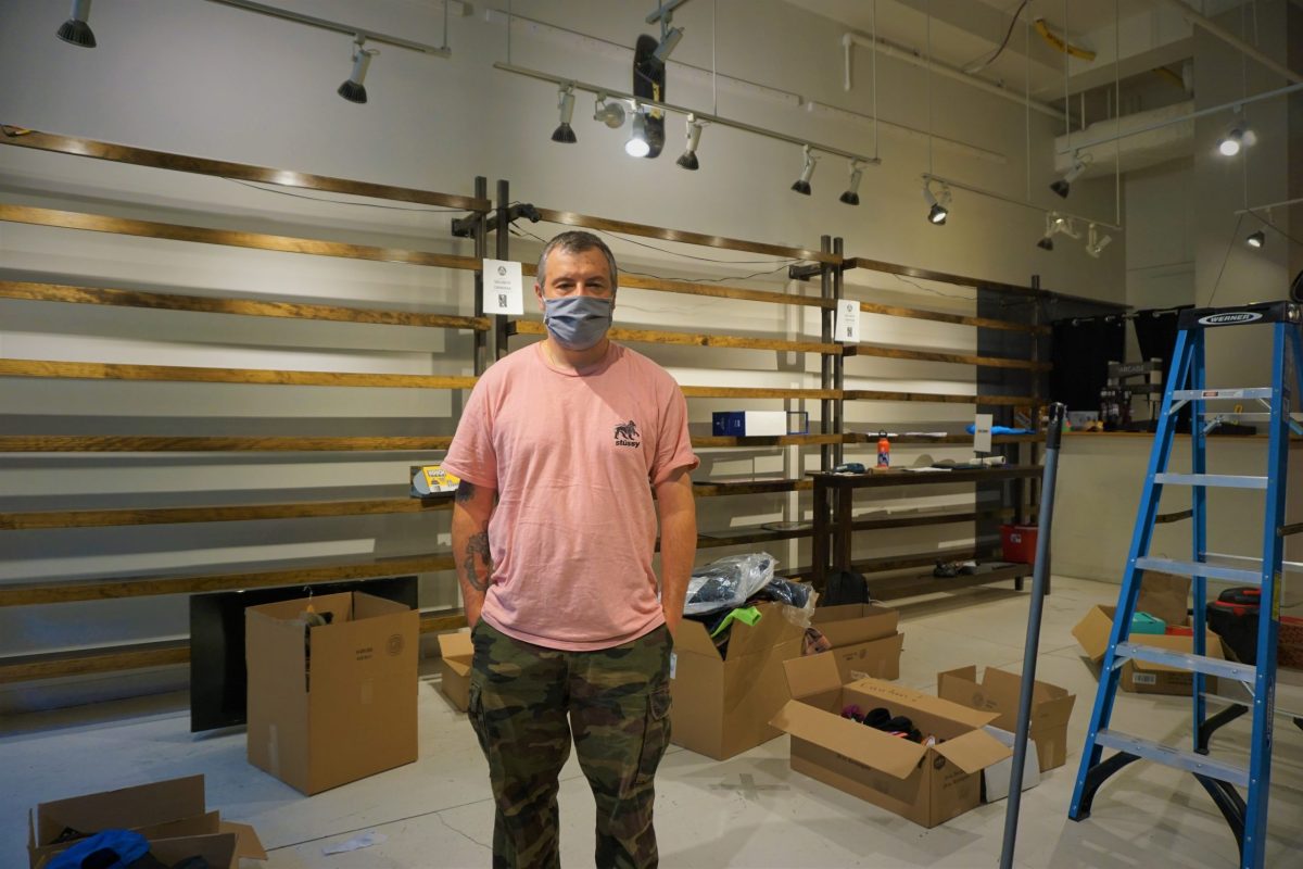 Guido Silvestri stands in his skateboard shop in downtown Providence, which was looted Monday night.