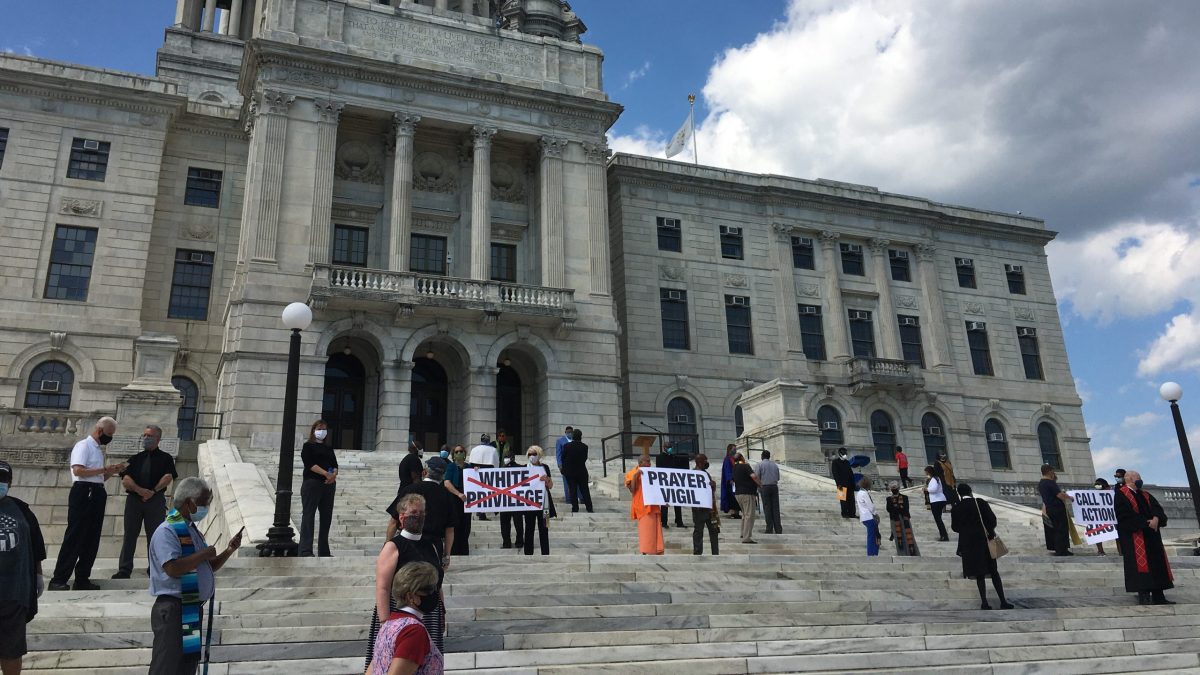 Faith leaders stand on the steps of the Rhode Island State House for a prayer vigil, June 4, 2020.
