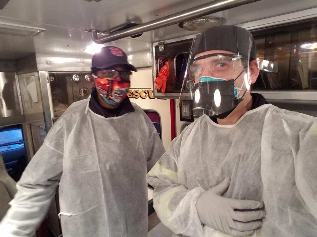 Providence EMS workers in protective gear for responding to suspected coronavirus cases.