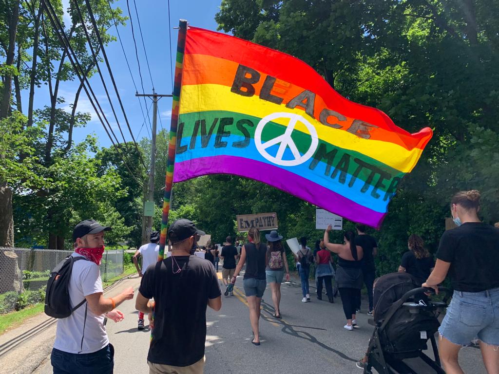 Protesters march for racial justice in Newport on Saturday, June 13.