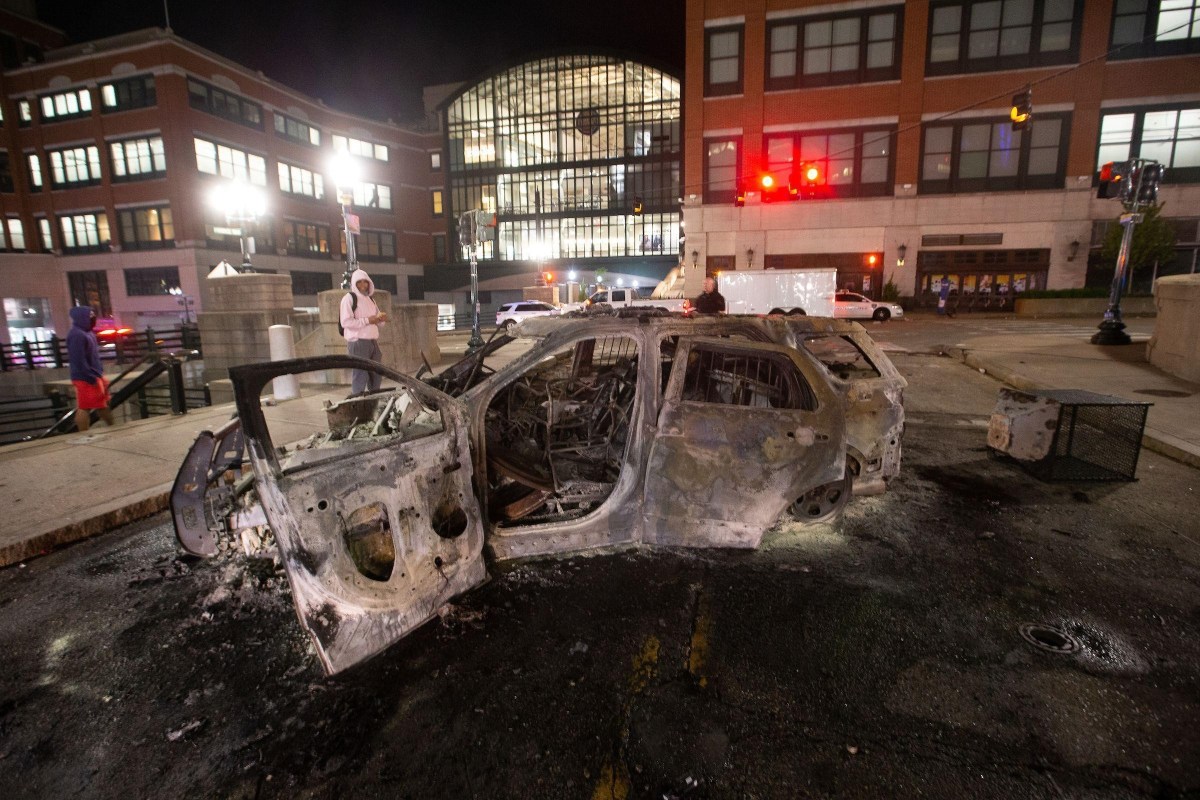 The Providence Police cruiser that was set on fire near the entrance to the Providence Place mall during a night of looting and destruction June 1.