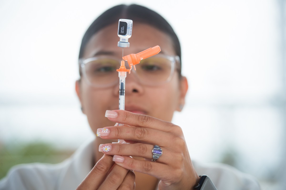 Lubia Esquivel, a member of the Rhode Island National Guard, and vaccine handler, at the Bucklin Park Clinic earlier this month