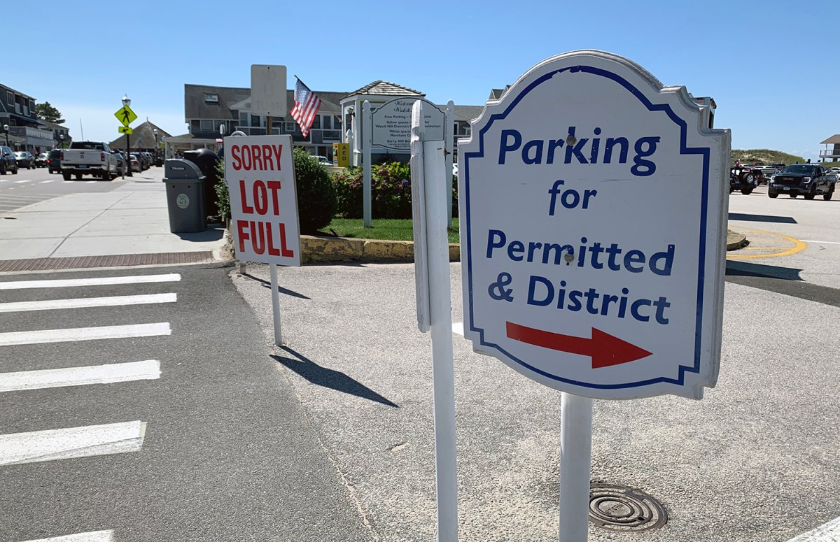 A sign in the Watch Hill section of Westerly tells drivers that a private parking lot owned by the Watch Hill Fire District is closed to the public. Property owners in the fire district can use a separate lane to find free parking.