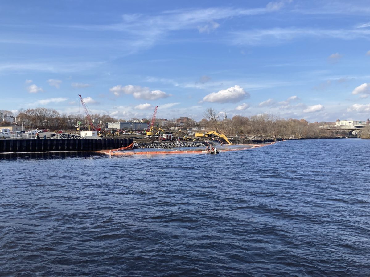 A boom intended to keep contaminants from polluting the Seekonk River at the Tidewater site.