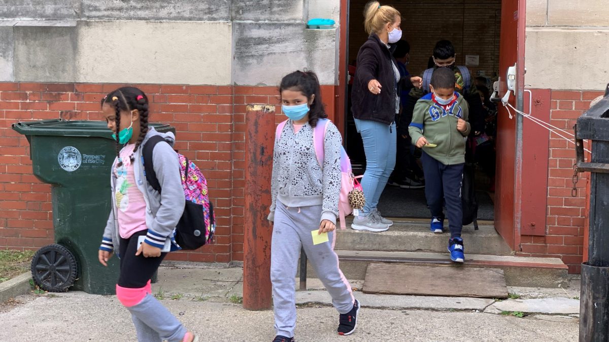 Dismissal time at the Alan Shawn Feinstein Elementary School in Providence, September 2021