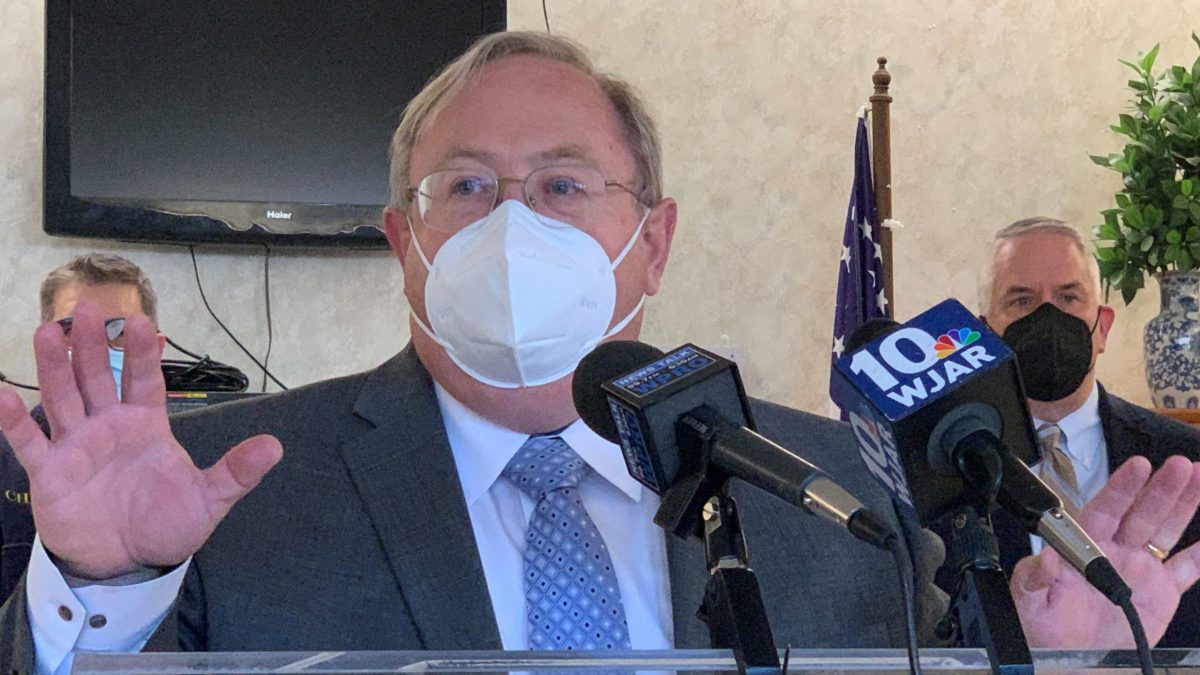 R.I. Interim Health Director Dr. Jim McDonald speaks at a news conference in January 2022.