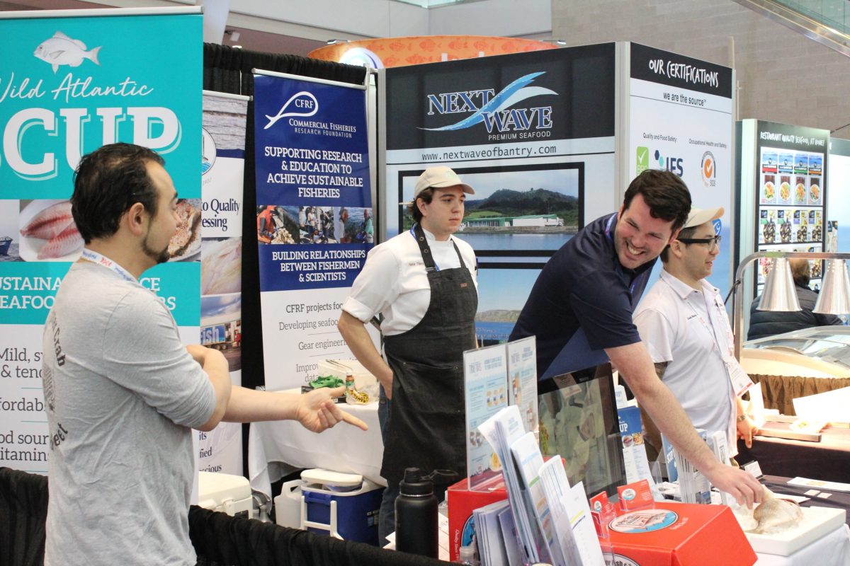 David Bethoney (left) talks with Mike Long at the North American Seafood Expo.