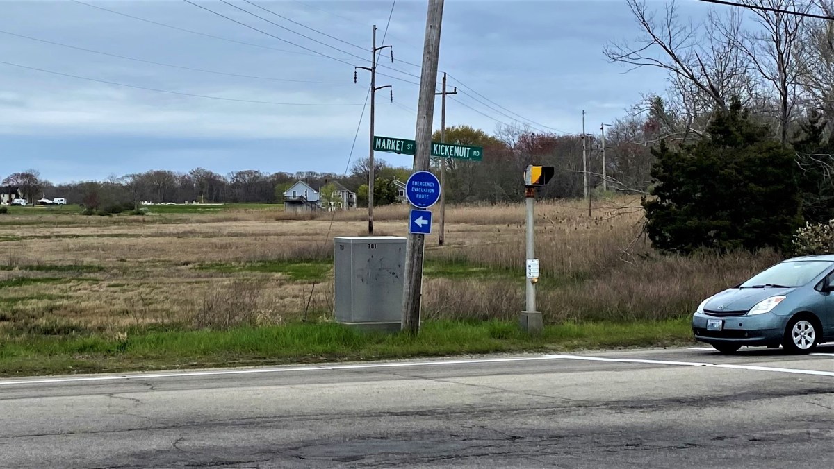 Market Street is an evacuation route out of Warren, RI that is projected to flood as sea level rises. Portions of the road are just feet from a tidal marsh and Belcher Cove.
