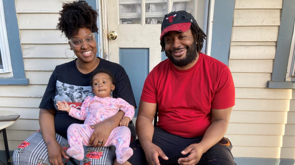 Kymuana Lumpkins, her husband, Emir Roberson, and their daughter, Rosabella