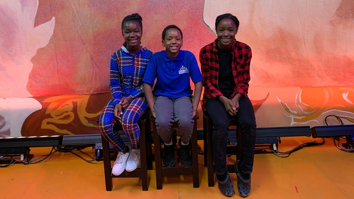 From left to right, Helen, Joshua and Kaelynn, students at SouthSide Elementary Charter School in Providence, after performing in a Juneteenth celebration at Mixed Magic Theatre in Pawtucket on June 15, 2022.