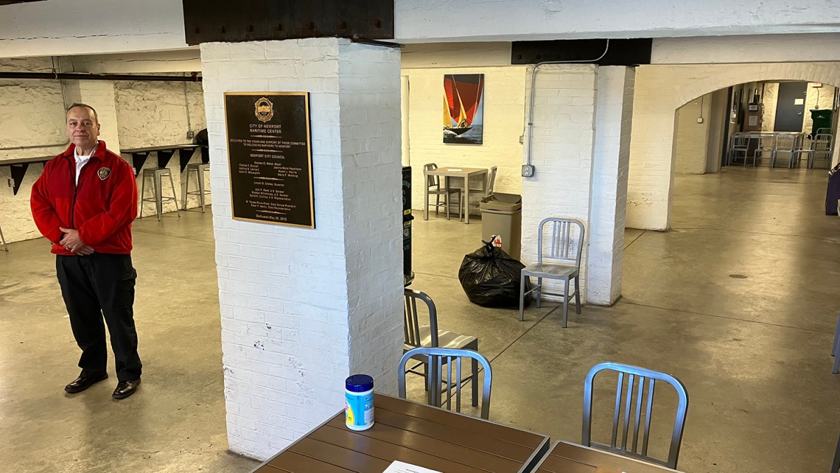 Newport Fire Chief Harp Donnelly stands in the temporary overnight warming center at the Maritime Center at 365 Thames Street.