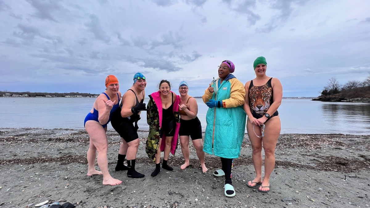 A group of local winter swimmers pose for a portrait before they swim at Potter Cover in Jamestown, Rhode Island, on Sunday, Jan. 29, 2023. From left: Cheryl Hatch, Catherine Davis Hayes, Natalie Coletta, Kelly Phillips, Jess Brown and Christina Lorenson.
