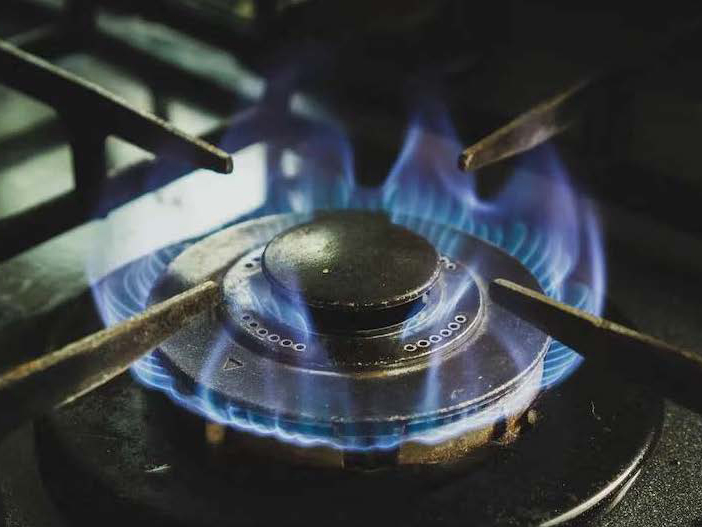 A lit gas stove