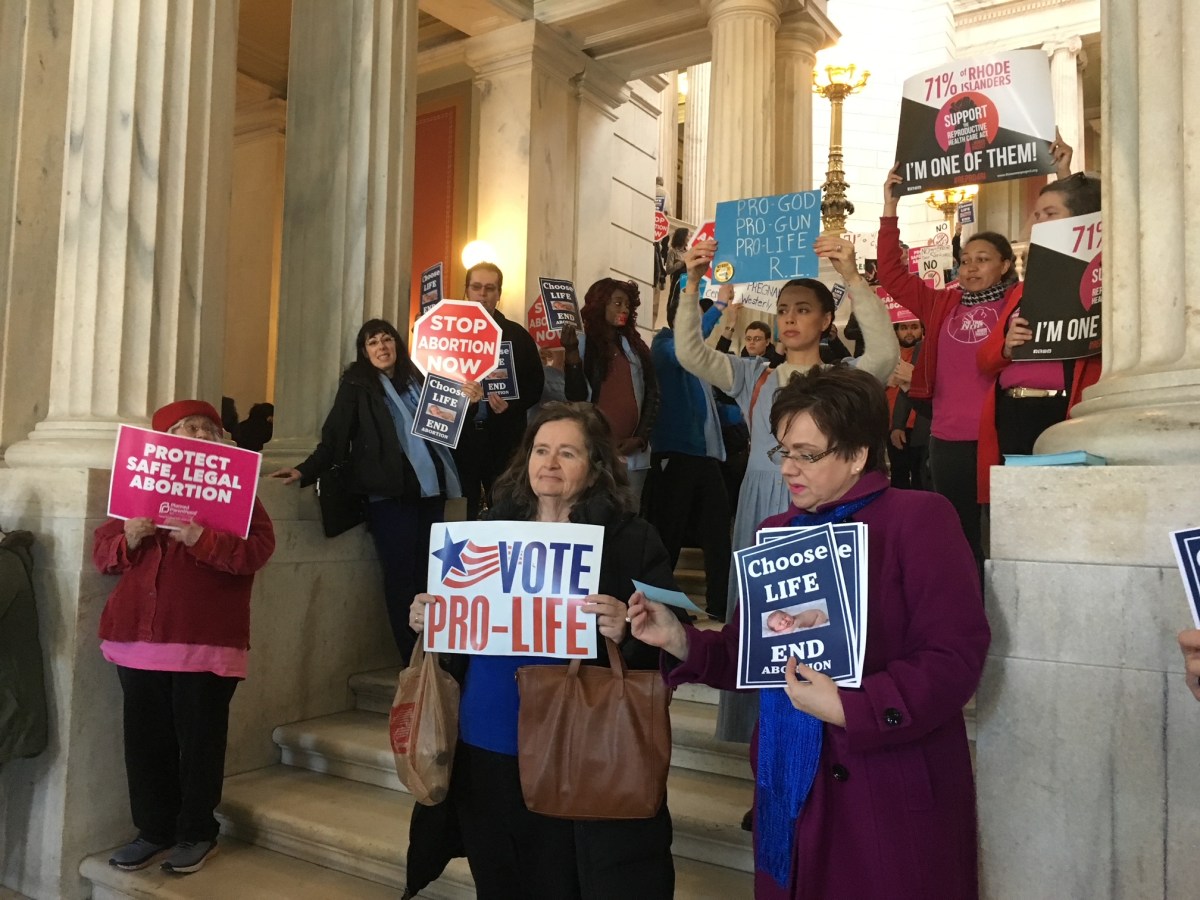 Both sides of the abortion debate during a past action at the Statehouse.