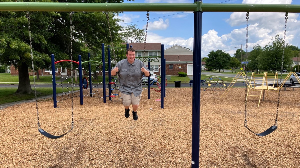Chris Bove swings at the park in Oxbow Farms in Middletown on Saturday, June 10, 2023. Bove grew up at Oxbow Farms with his single mother and brother when nearly two-thirds of the units on the property were deed-restricted and designated affordable housing.