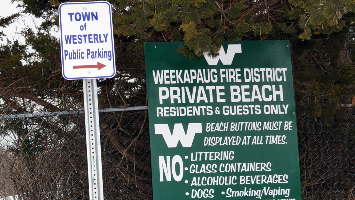 A sign near the entrance of a private boardwalk leading to the Quonochontaug Barrier Beach in the Weekapaug section of Westerly.