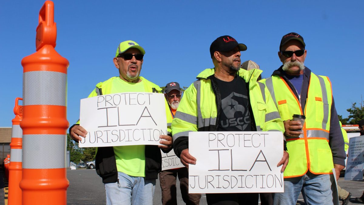Workers from Local 1413 of the International Longshoremen’s Association picket at the New Bedford Marine Commerce Terminal on Friday, May 26.
