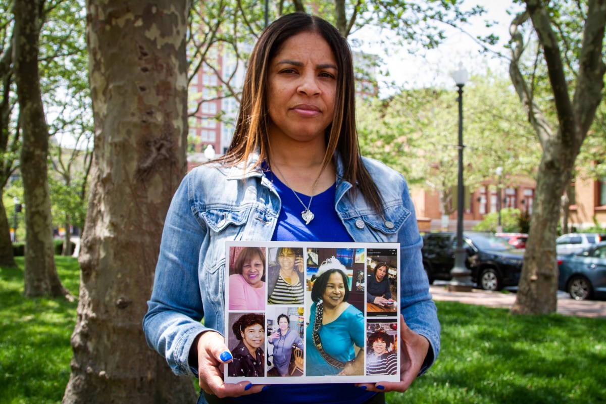 Tiqua Pona holds a photo collage of her mother Carol Pona in a park where the two spent time together.