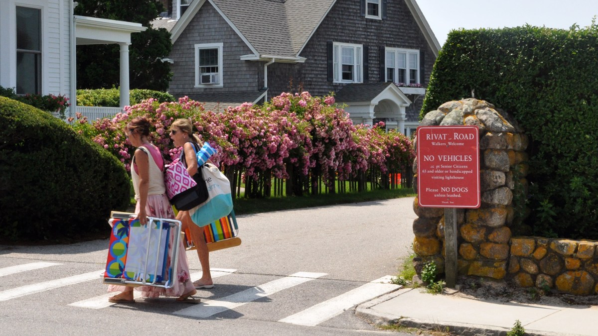 A private road sign is posted at the entrance of Lighthouse Road, the access road to the Watch Hill Lighthouse property.