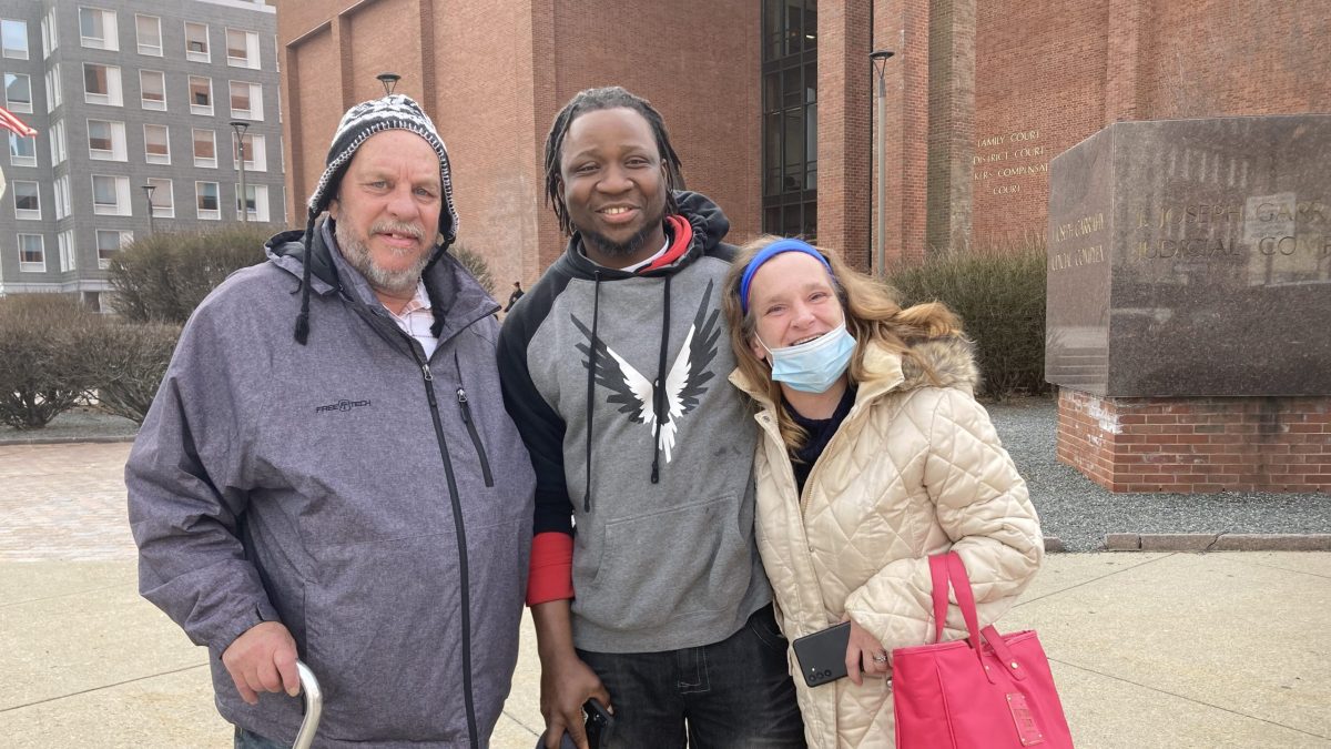 Mack Blackie (center) with William Grover and his wife, Veronica Higbie, outside the Garrahy Judicial Complex in Providence, in February 2023.