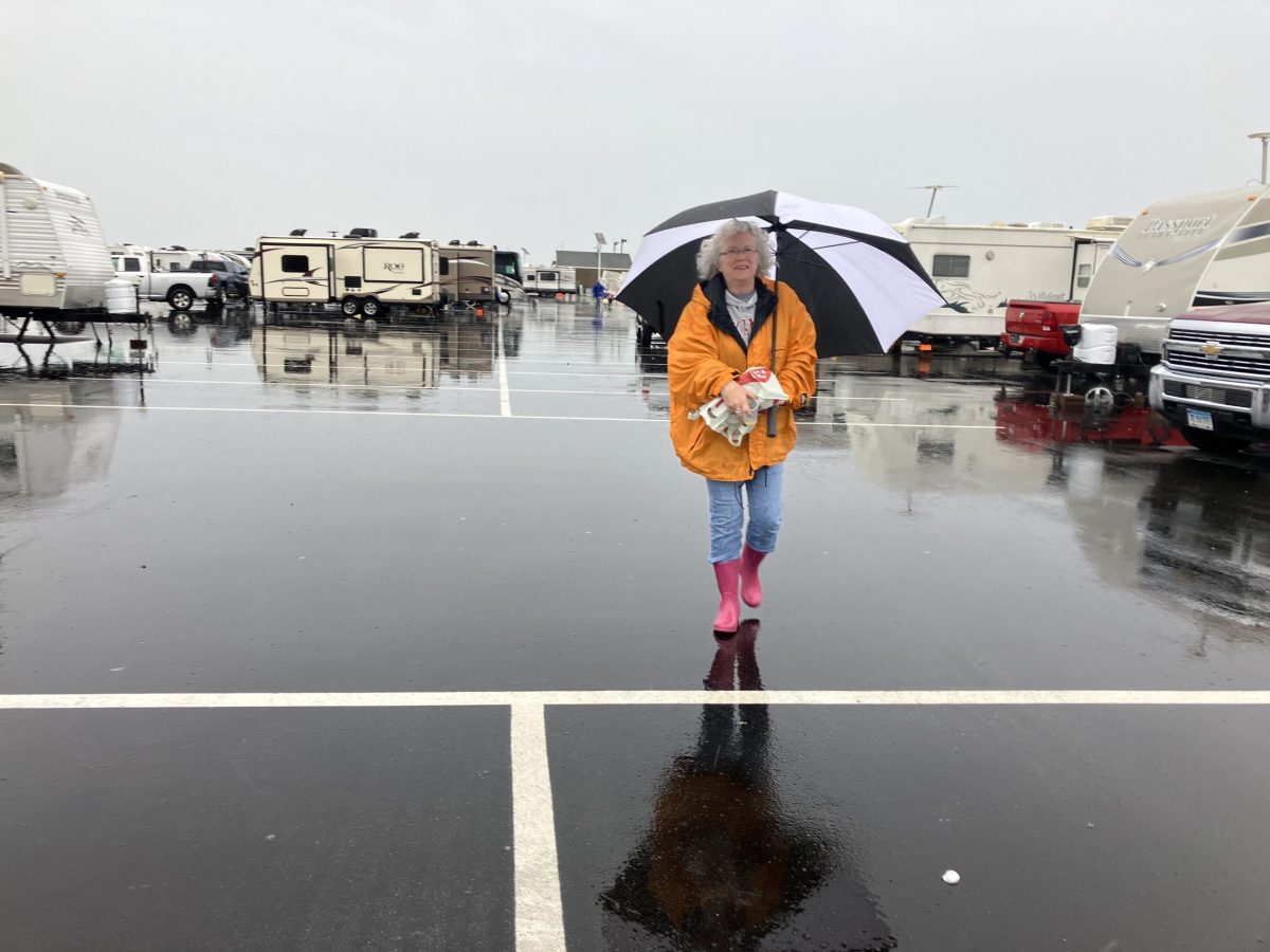 Diane Gauthier heads back to her camper with a breakfast of French toast, sausage and orange juice at Camp-O-Rama on Saturday, September 16, 2023.