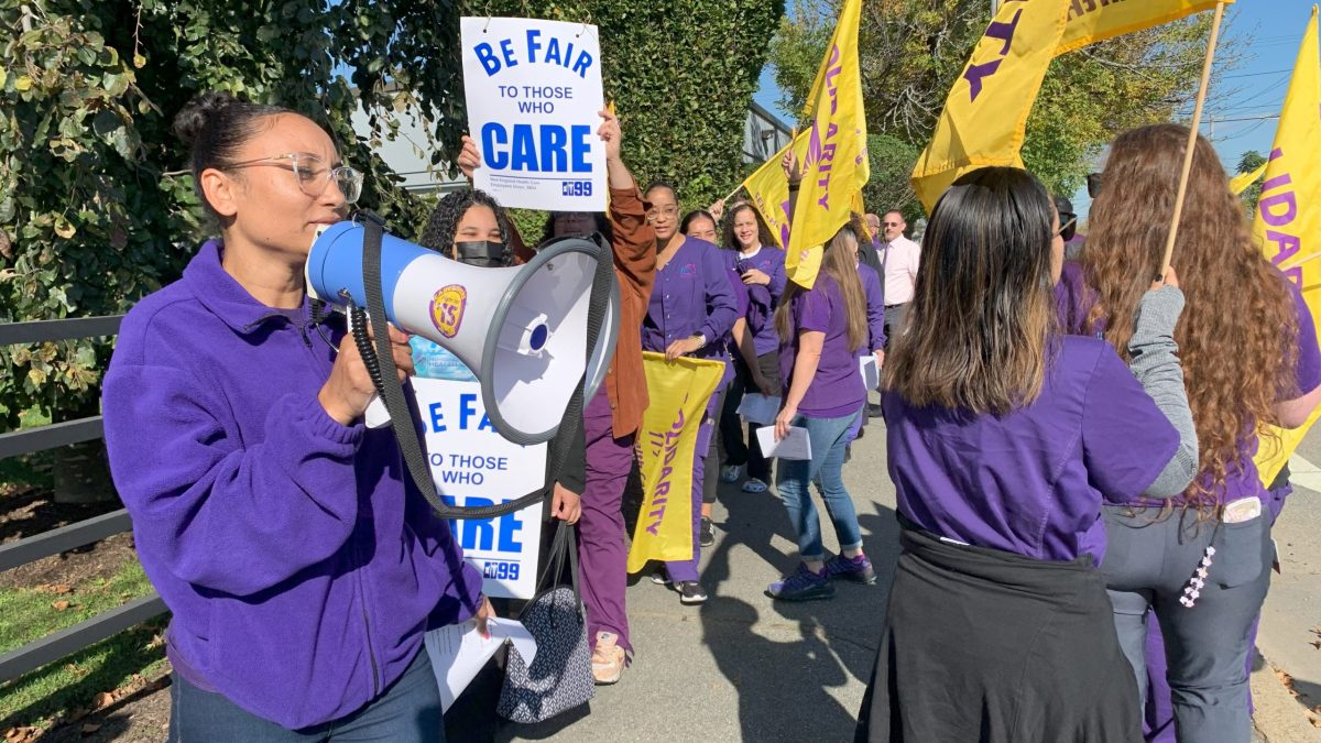 Unionized workers at the Providence Community Health Centers picket Oct. 12, 2023 demanding improvements in staffing, work schedules and wages.