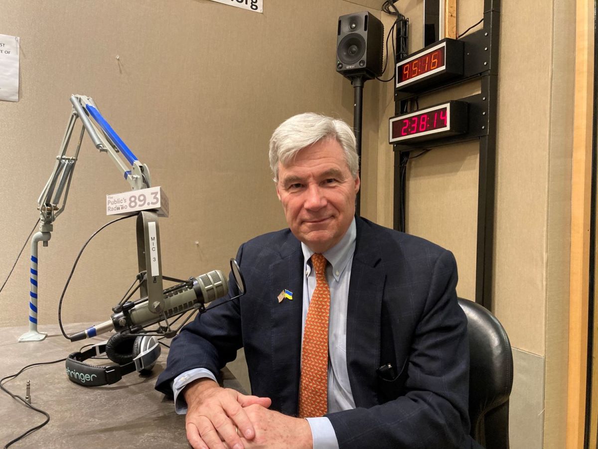 U.S. Sen. Sheldon Whitehouse sits at a table in a recording studio at The Public's Radio