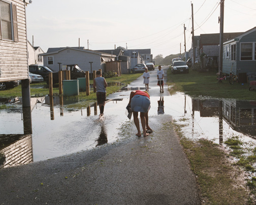 A photograph captures daily life at Roy Carpenter’s Beach in South Kingstown.